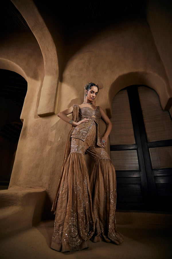 Beige gold tissue gharara set with bustier, jacket and dupatta